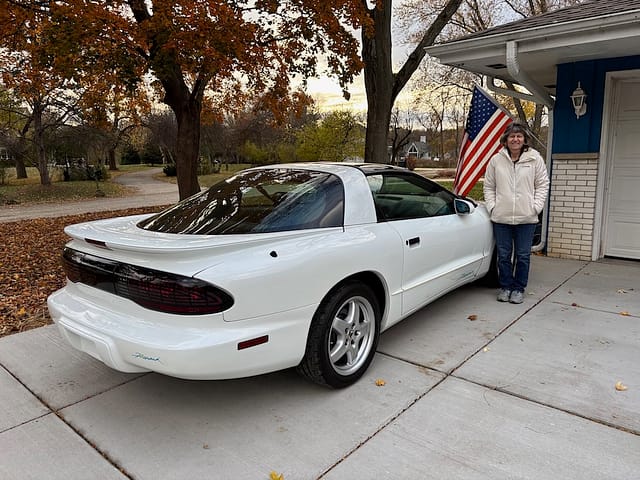 Kelly with her new 1995 Pontiac Firebird Firehawk